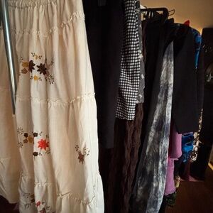 Lot of 19 women’s dresses and 4 skirts